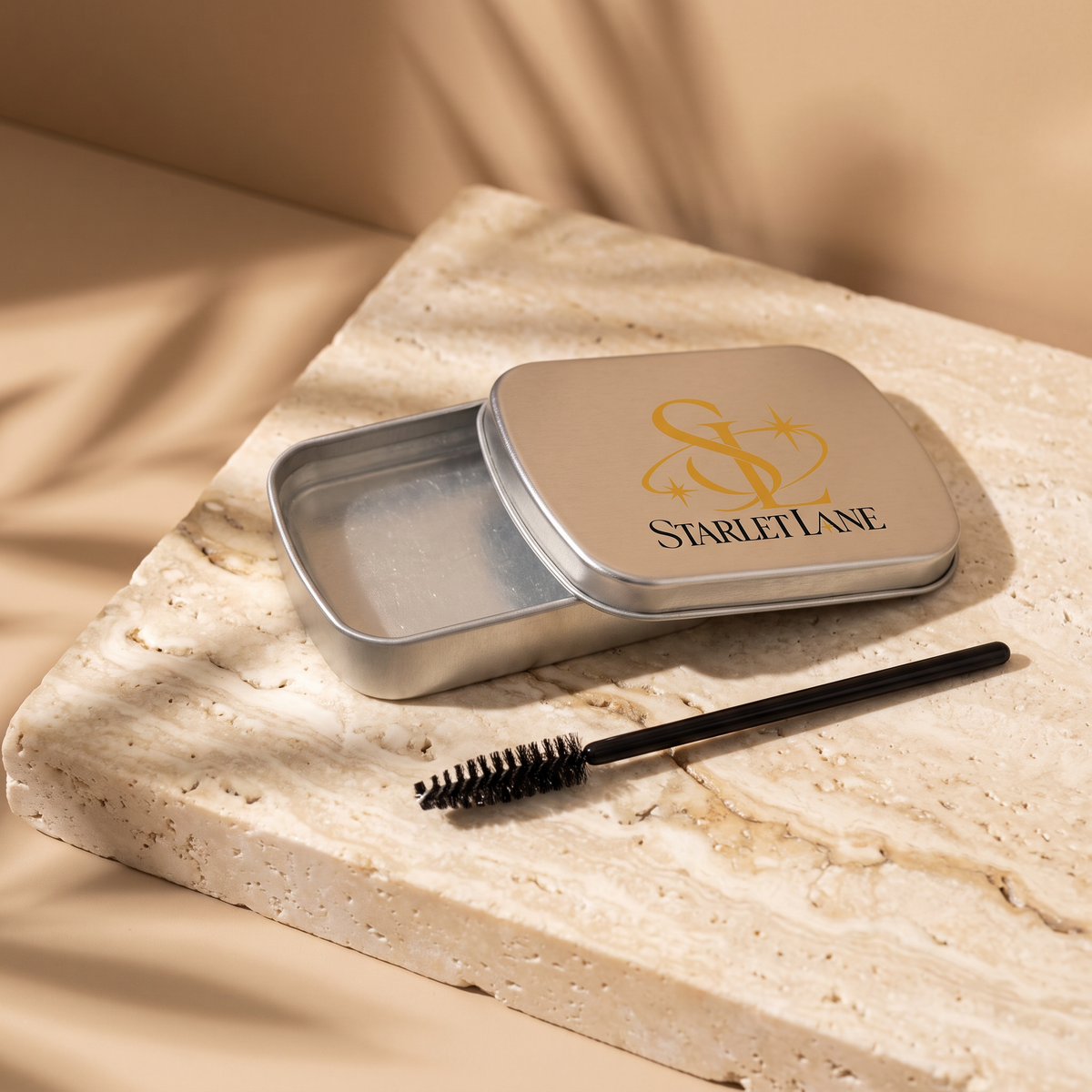 Starlet Lane Brow Soap with spoolie on travertine